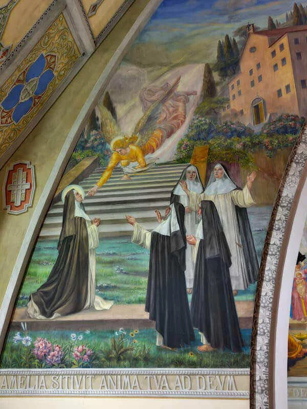 Un ange apporte la communion à sainte Amélie devant les religieuses